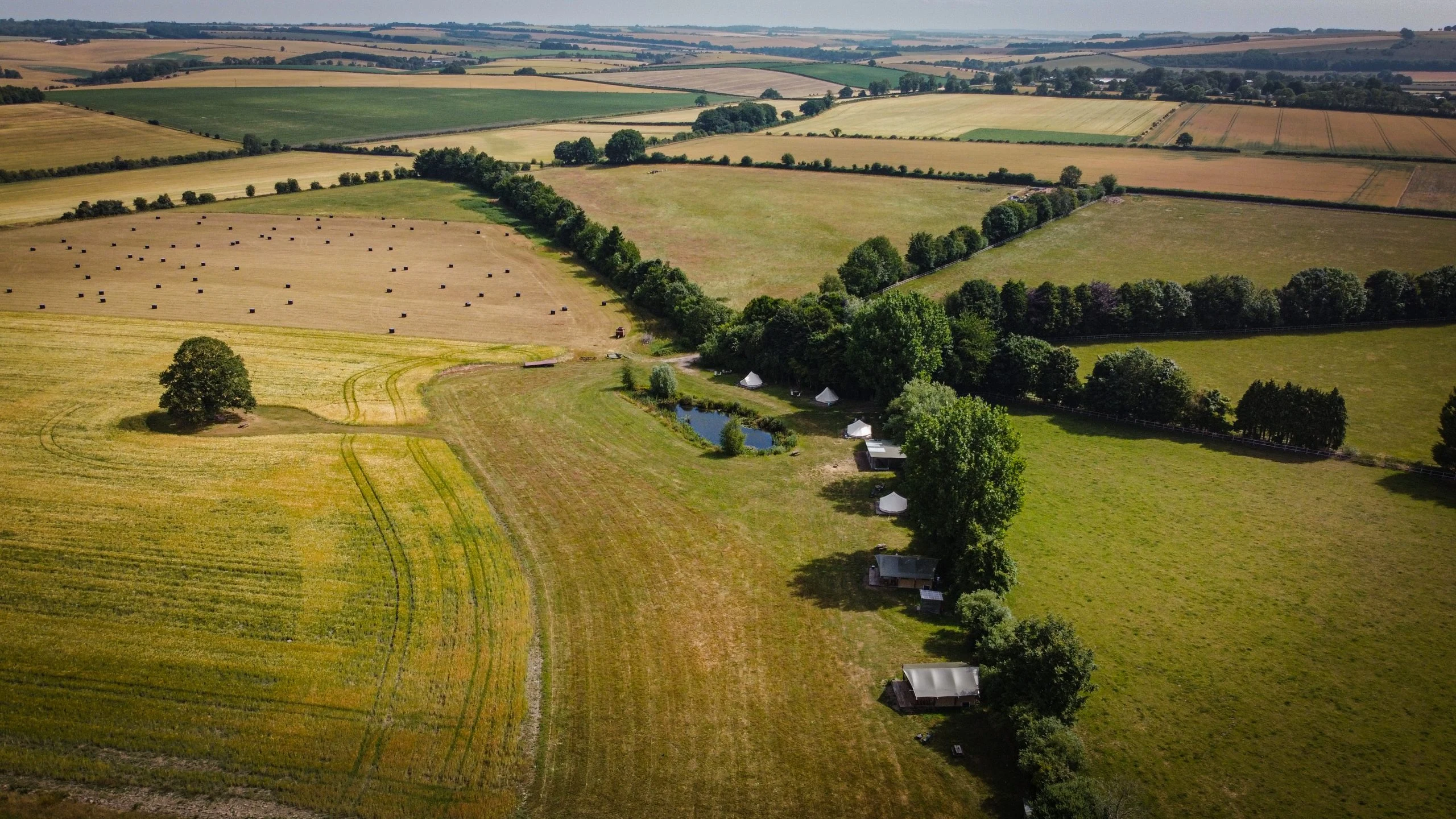 Aerial view of Chalke Valley Camping from 2016 with five bell tents