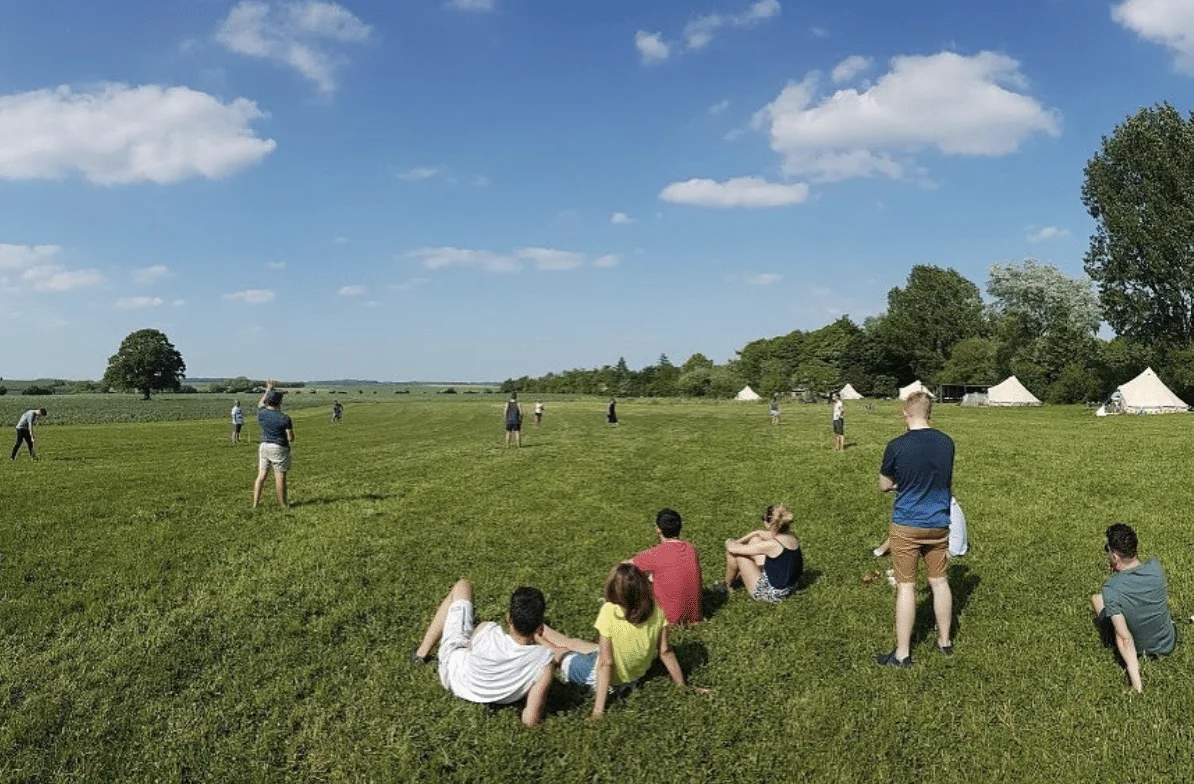 Stag group playing rounders at Chalke Valley Camping